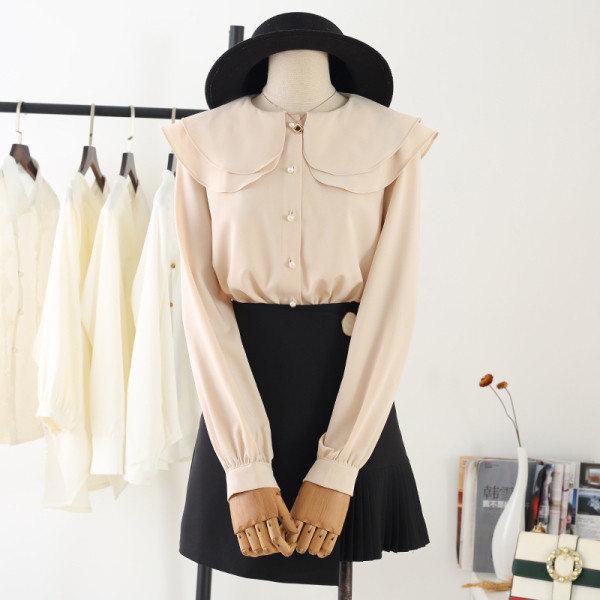 Modern női ing ovális nyakkivágással, gombokkal és hosszú ujjakkal