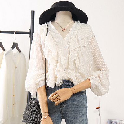 Modern női ing széles ujjal és spitz nyakkivágással