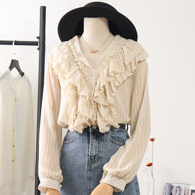 Modern női ing széles ujjal és spitz nyakkivágással