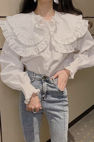 Uue mudeli valge naiste särk pikkade varrukate ja nööpidega