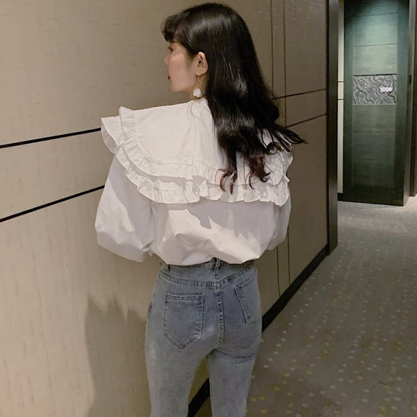 Uue mudeli valge naiste särk pikkade varrukate ja nööpidega