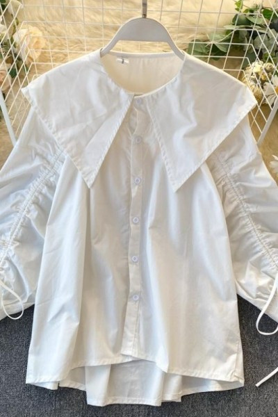 Ежедневна дамска риза с връзки на ръкавите и копчета - асиметричен модел