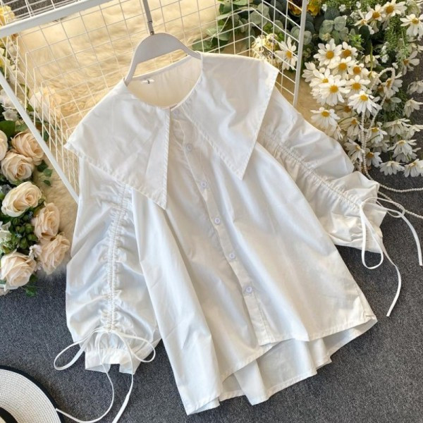 Ежедневна дамска риза с връзки на ръкавите и копчета - асиметричен модел