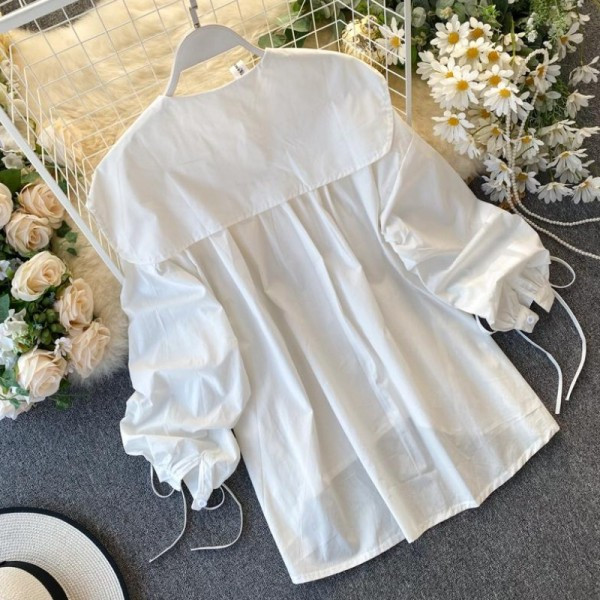 Ежедневна дамска риза с връзки на ръкавите и копчета - асиметричен модел