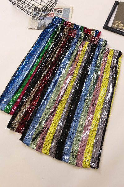 Värviline naiste keskmise pikkusega, kõrge vöökoha ja litritega seelik