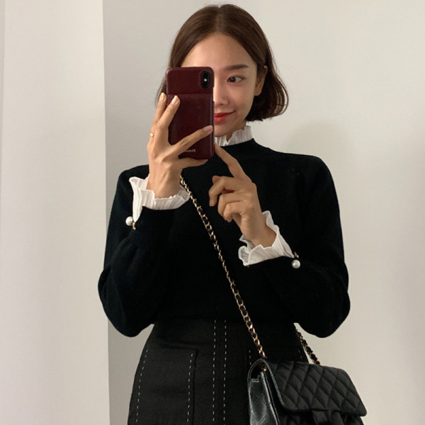 Naiste moodne pärlitega pluus varrukatel ja kõrge kaelusega