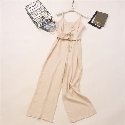 Peenikeste rihmade ja vöökoha lipsudega ruuduline naiste kombinesooni lai mudel