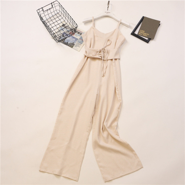 Peenikeste rihmade ja vöökoha lipsudega ruuduline naiste kombinesooni lai mudel