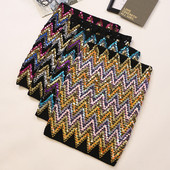 Къса дамска пола с висока талия и цветни пайети