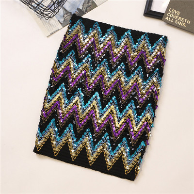 Къса дамска пола с висока талия и цветни пайети