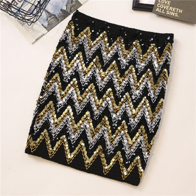 Къса дамска пола с висока талия и цветни пайети