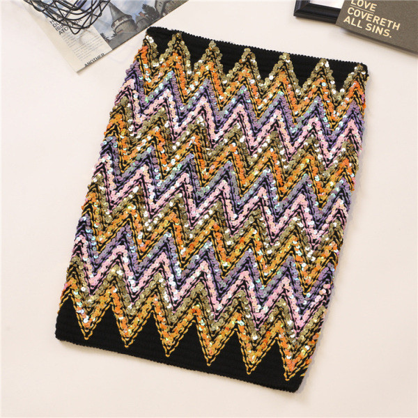 Къса дамска пола с висока талия и цветни пайети