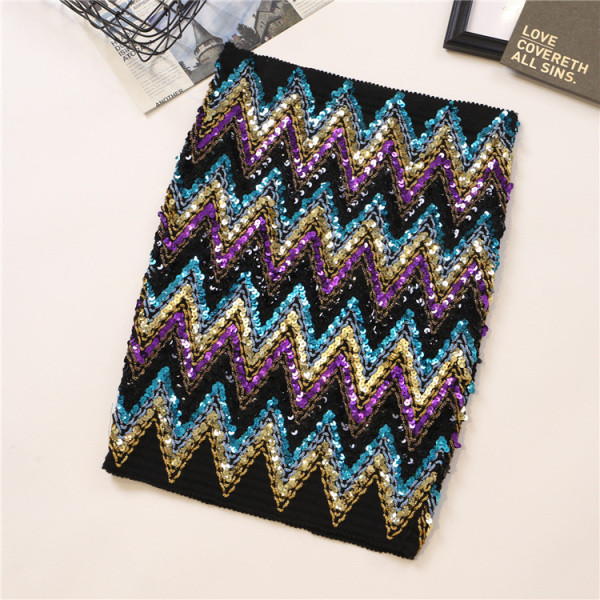 Къса дамска пола с висока талия и цветни пайети