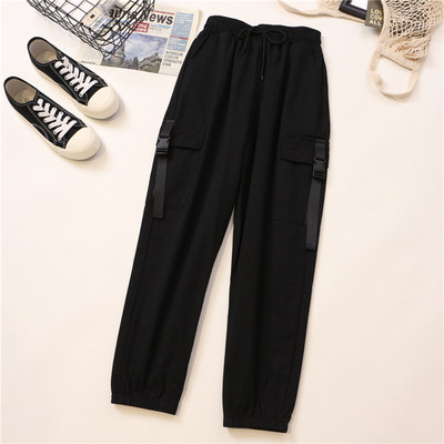 Alkalmi női nadrág oldalzsebekkel és gumírozott derékkal