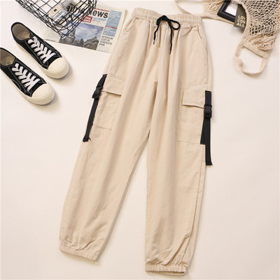 Alkalmi női nadrág oldalzsebekkel és gumírozott derékkal