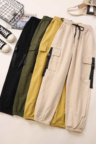 Alkalmi női nadrág oldalzsebekkel és gumírozott derékkal