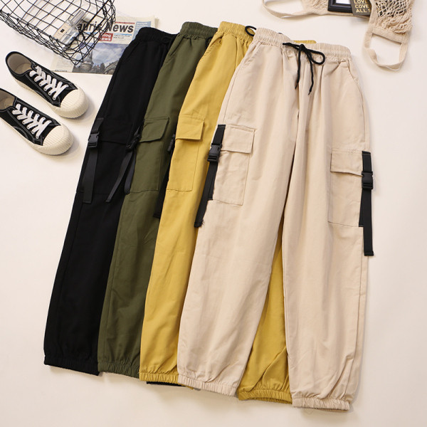 Alkalmi női nadrág oldalzsebekkel és gumírozott derékkal