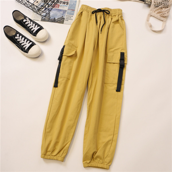 Alkalmi női nadrág oldalzsebekkel és gumírozott derékkal