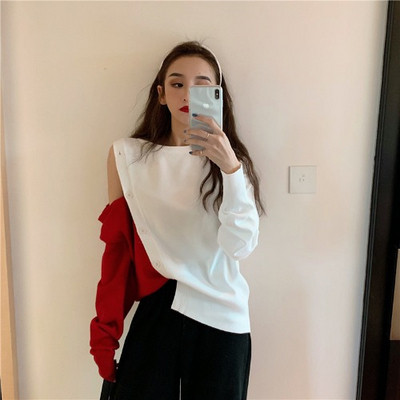 Kéttónusú női blúz leejtett ujjakkal és gombokkal