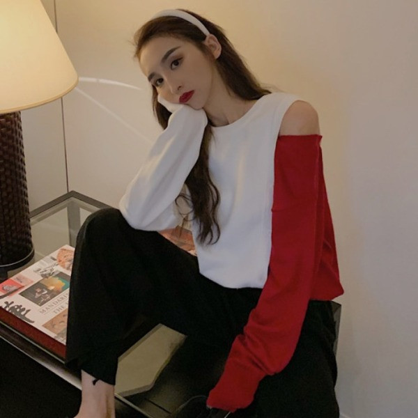 Kéttónusú női blúz leejtett ujjakkal és gombokkal