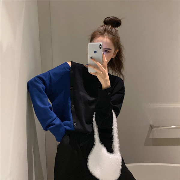 Kéttónusú női blúz leejtett ujjakkal és gombokkal