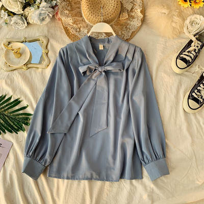 Modern női ing gallérján szalaggal és hosszú ujjal