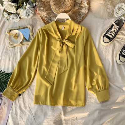 Modern női ing gallérján szalaggal és hosszú ujjal