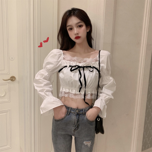 Moodne naiste alandatud varrukatega pluus pitsiga