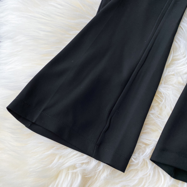 Moodsad naiste mustad püksid kõrge vöökohaga – lai mudel