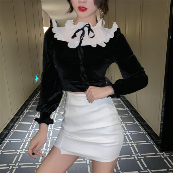 Baršunasta ženska bluza s niskom kragnom oko vrata i vezanjem