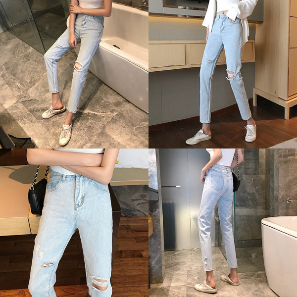 Kõrge vöökoha ja rebenenud motiividega heledad naiste teksad