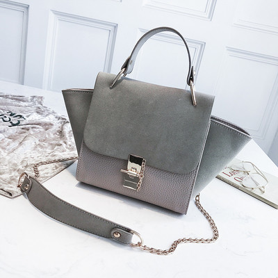 Актуална дамска чанта с къса и дълга метална дръжка 