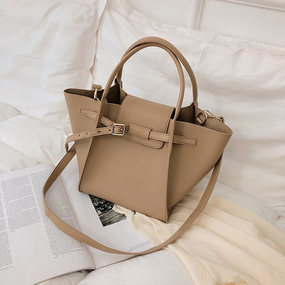 Öko-nahast ja lühikeste sangadega naiste vabaajakott