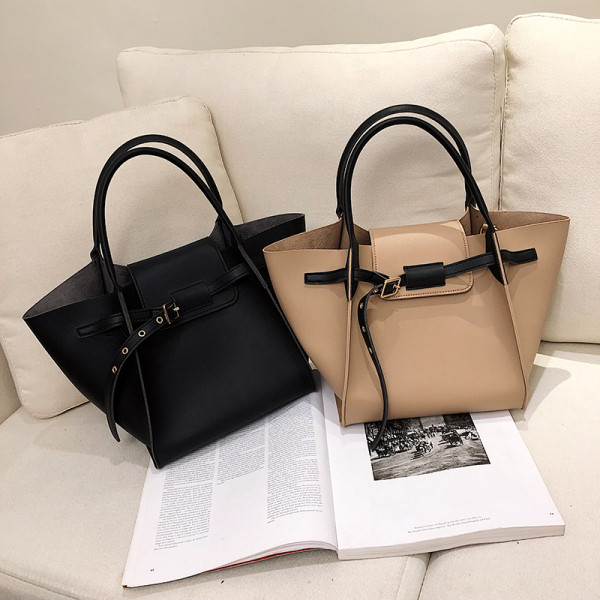 Öko-nahast ja lühikeste sangadega naiste vabaajakott