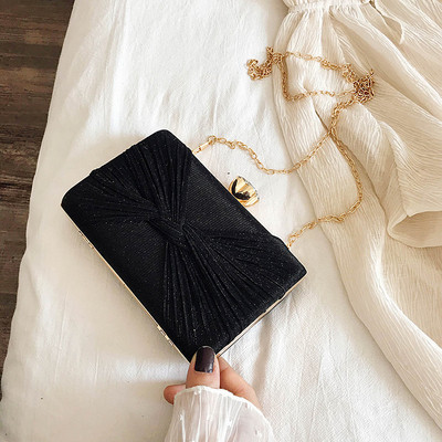 Fényes hatású, elegáns női táska fém fogantyús lánccal