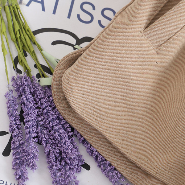 Elastse vöökoha ja nööpidega vabaaja püksid