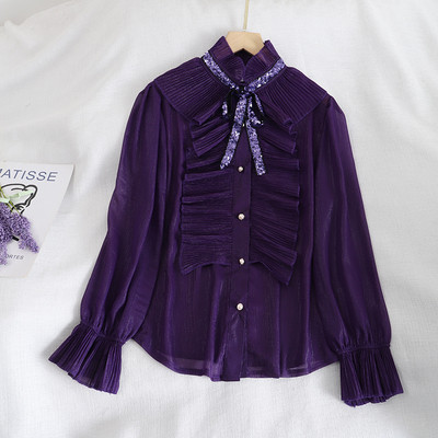 Naiste lipsude ja nööpidega šifoonist särk