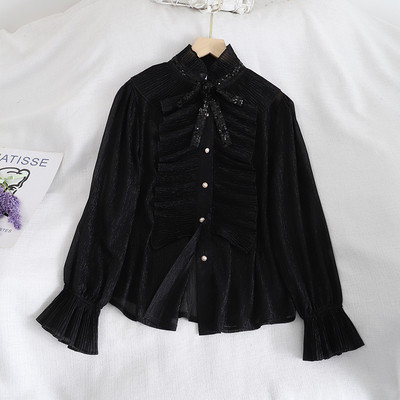 Naiste lipsude ja nööpidega šifoonist särk