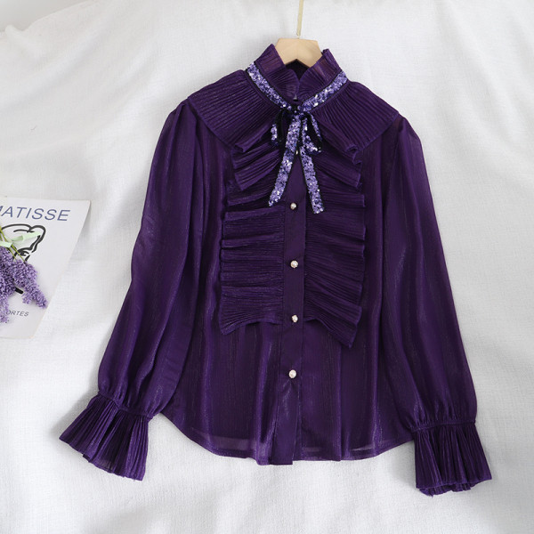 Naiste lipsude ja nööpidega šifoonist särk