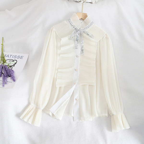 Naiste lipsude ja nööpidega šifoonist särk