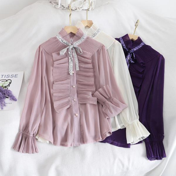 Naiste lipsude ja nööpidega šifoonist särk