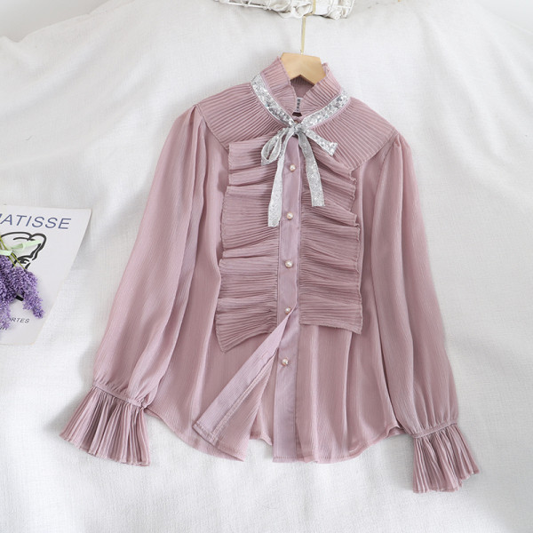 Naiste lipsude ja nööpidega šifoonist särk