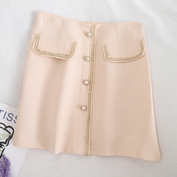 Aktuelna ženska suknja na dugmad i visokog struka