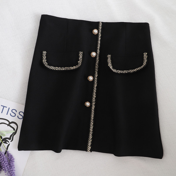 Aktuelna ženska suknja na dugmad i visokog struka