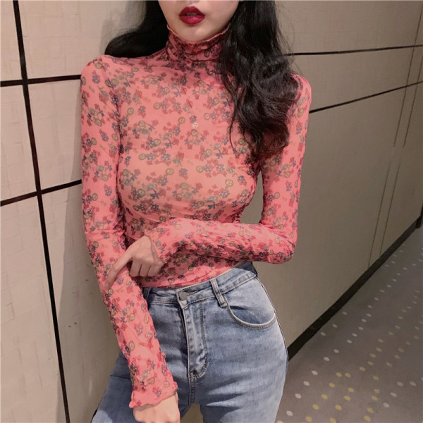 Lillemustri ja kõrge kraega naiste pitspluus