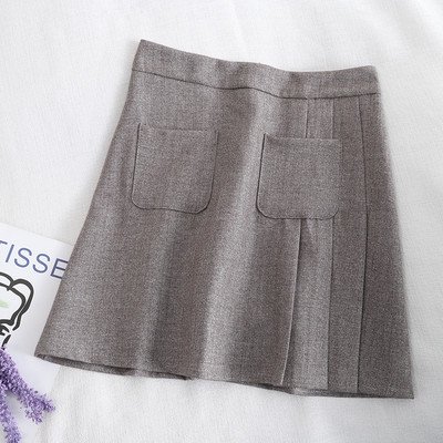 Lühike naiste seelik taskute ja kõrge vöökohaga