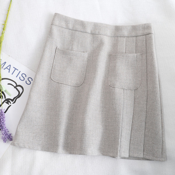 Lühike naiste seelik taskute ja kõrge vöökohaga