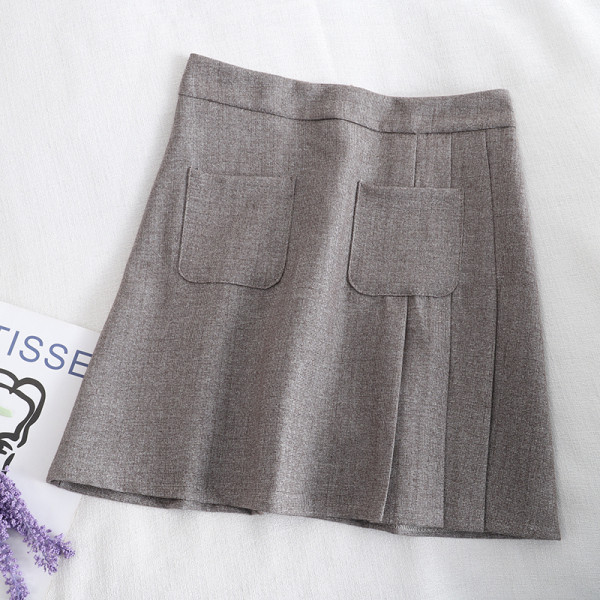 Lühike naiste seelik taskute ja kõrge vöökohaga
