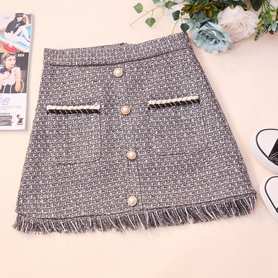 Kõrge vöökoha, narmaste, nööpide ja taskutega aktuaalne naiste seelik