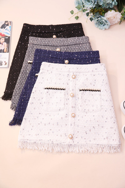 Kõrge vöökoha, narmaste, nööpide ja taskutega aktuaalne naiste seelik